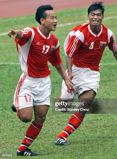 Aung Tun Naing of Myanmar in ecstacy while Team Mate Aung Kyaw Moe join him to celebrate his first goal in a Group A match at the MPPJ Stadium,...