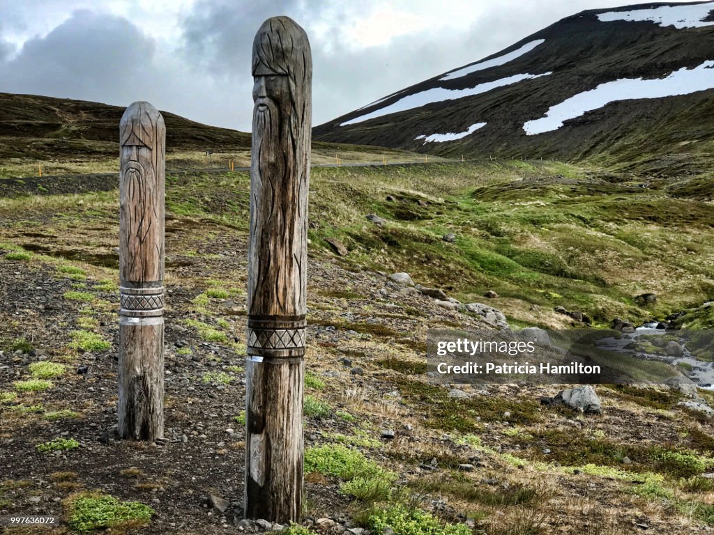Carved road markers in saga Viking style, near Isafjordur