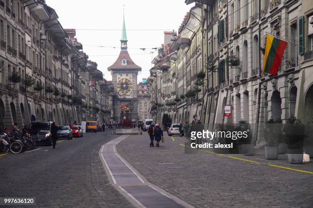 bern switzerland old town kramgasse street - bern clock tower stock pictures, royalty-free photos & images