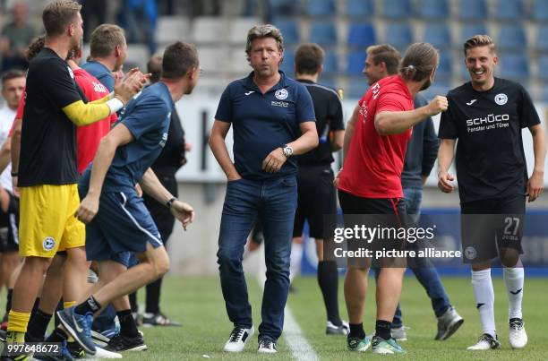 Bielefeld's coach Jeff Saibene reacts after the 2-1 goal during the German 2. Bundesliga soccer match between Arminia Bielefeld and Jahn Regensburg...