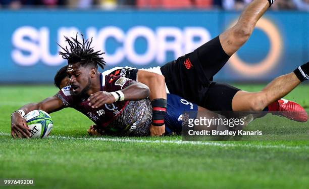 Moses Sorovi of the Reds scores a try during the round 19 Super Rugby match between the Reds and the Sunwolves at Suncorp Stadium on July 13, 2018 in...