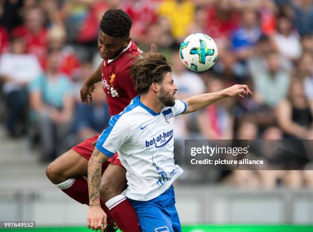 Hertha's Marvin Plattenhardt and Liverpool's Dominic Solanke vie for the ball during the international club friendly soccer match between Hertha BSC...