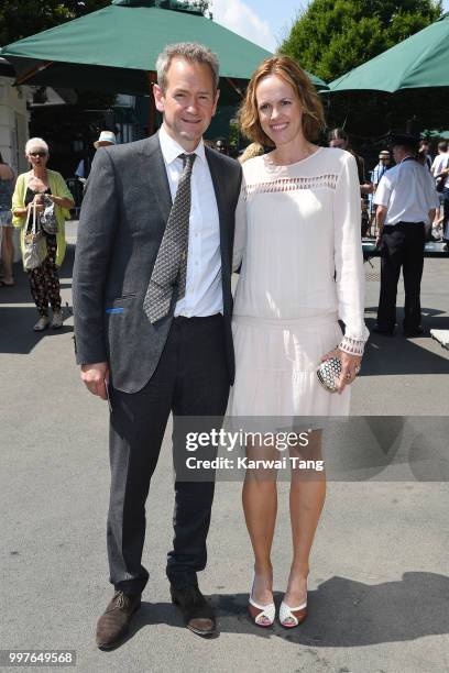 Alexander Armstrong and his wife Hannah Bronwen Snow attend day eleven of the Wimbledon Tennis Championships at the All England Lawn Tennis and...