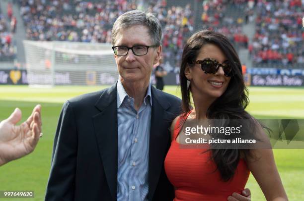 The owner of FC Liverpool John Henry with his wife Linda Pizzuti ahead of the international club friendly soccer match between Hertha BSC and FC...