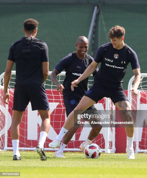 Ashley Young and John Stones of England take part in a drill during an England training session during the 2018 FIFA World Cup Russia at Spartak...