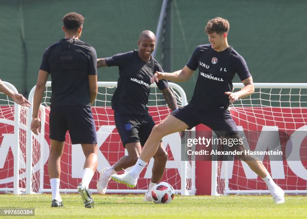Ashley Young and John Stones of England take part in a drill during an England training session during the 2018 FIFA World Cup Russia at Spartak...