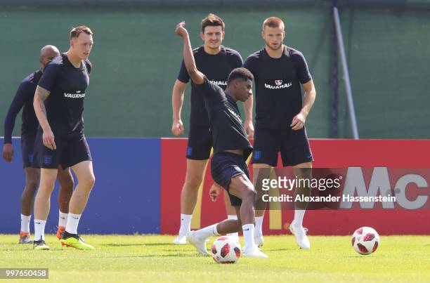 Marcus Rashford of England takes part in a drill with team mates during an England training session during the 2018 FIFA World Cup Russia at Spartak...