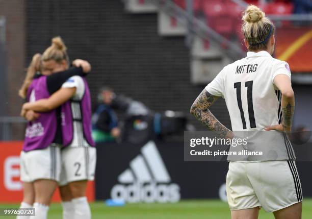 Germany's Anja Mittag reacts after the UEFA Women's EURO quarterfinals soccer match between Germany and Denmark at the Sparta Stadium in Rotterdam,...