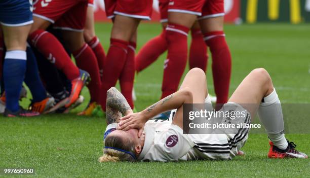 Germany's Anja Mittag reacts after the UEFA Women's EURO quarterfinals soccer match between Germany and Denmark at the Sparta Stadium in Rotterdam,...