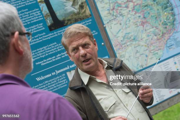 Nature park ranger Jens Krohnfuss of the national park watch, photographed at 'Koenigsstuhl' rock formation in the national park Jasmund near...