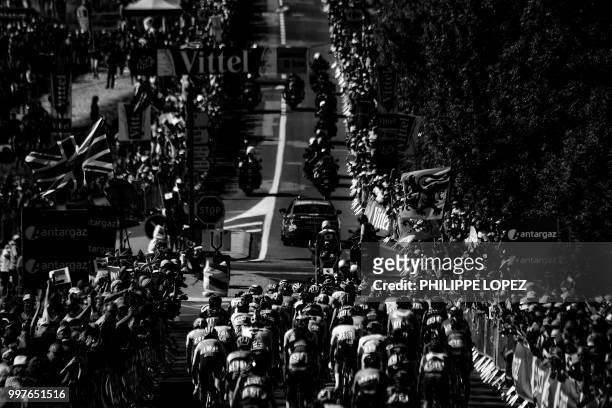 The pack ascends the Mur-de-Bretagne hill during the sixth stage of the 105th edition of the Tour de France cycling race between Brest and...