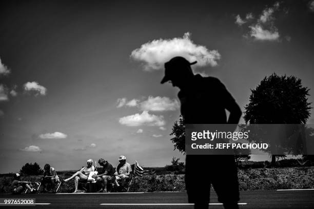Spectators wait at the finish line in Mur-de-Bretagne, of the sixth stage of the 105th edition of the Tour de France cycling race between Brest and...