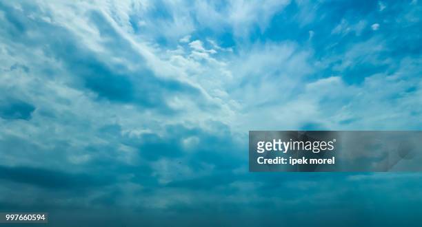 fluffy rain clouds - ipek morel stock pictures, royalty-free photos & images