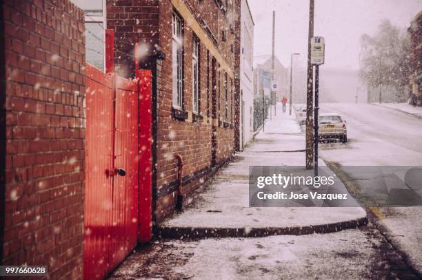 snowy street - vazquez stock pictures, royalty-free photos & images