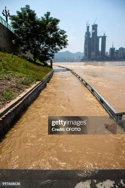 Chongqing, China, 13th July 2018. Under the influence of heavy rainfall and inflow, the Yangtze River, Jialing River and Fujiang River have obvious...