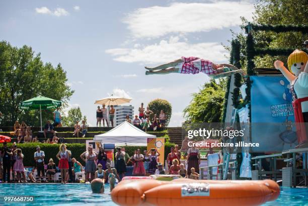 Participant 'Keitzi' in action at the 'Dirndl-Flug-Weltmeisterschaft' in Nuremberg, Germany, 30 July 2017. Several dozens of participants competed in...