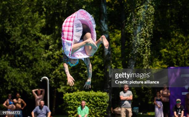 Participant 'Keitzi' in action at the 'Dirndl-Flug-Weltmeisterschaft' in Nuremberg, Germany, 30 July 2017. Several dozens of participants competed in...