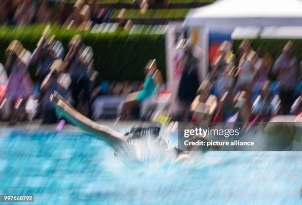 Participant in action at the 'Dirndl-Flug-Weltmeisterschaft' in Nuremberg, Germany, 30 July 2017. Several dozens of participants competed in the...