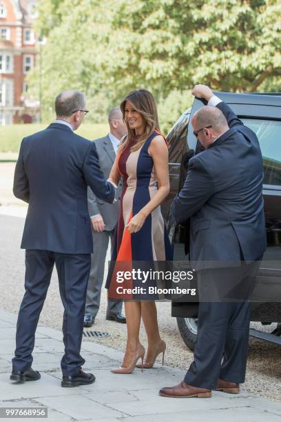 Philip May, husband of U.K. Prime Minister Theresa May, left, greets U.S. First Lady Melania Trump, during a visit to The Royal Hospital Chelsea in...