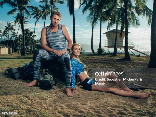 Marine biologist and conservationist Ocean Ramsey and underwater photographer Juan Oliphant are photographed for Paris Match on the Hawaiian beach of...