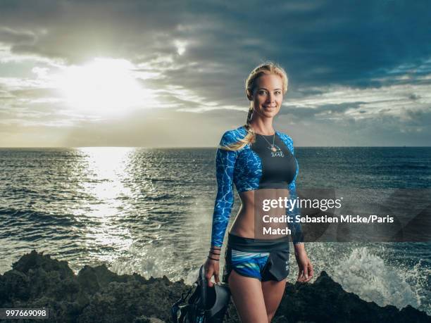 Marine biologist and conservationist Ocean Ramsey is photographed for Paris Match on the Hawaiian beach of Haleiwa on July 4, 2018.