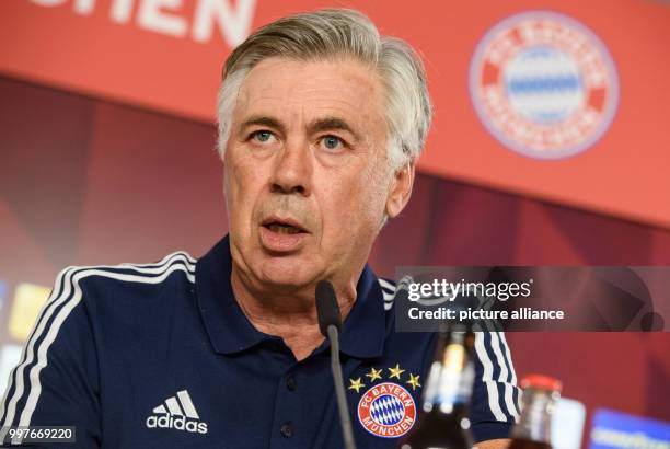 Bayern's coach Carlo Ancelotti speaks during a press conference for the presentation of the new team members at the training grounds at Saebener...