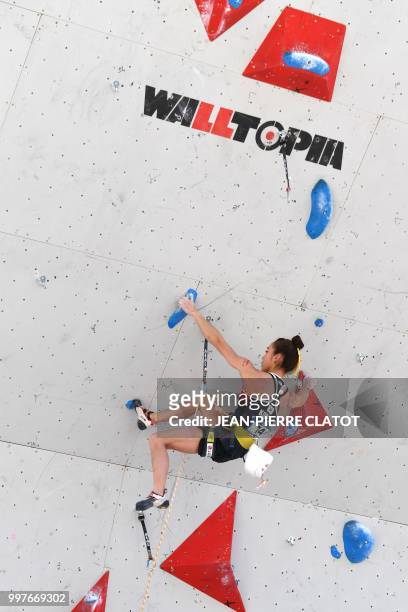 South Korea's Kim Ja-in climbs during the semi-final of 2018 International Federation of Sport Climbing Climbing World Cup in Chamonix on July 13 in...