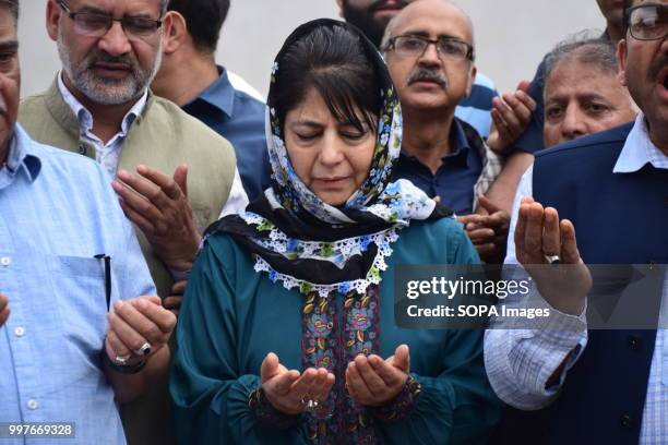 Former chief minister Mehbooba Mufti offers prayers near graves of martyrs at Martyr's Graveyard in Srinagar. July 13 is observed as Martyrs' Day in...