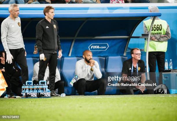 Assistant coach Thierry Henry of Belgium and other members of the Staff observing the match from the bench during the 2018 FIFA World Cup Russia Semi...