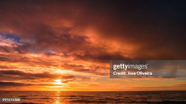 september sky at sunset - oliveira stock pictures, royalty-free photos & images