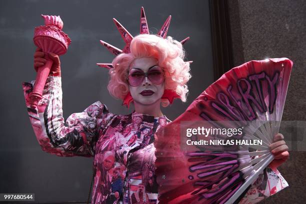 Drag queen joins protesters against the UK visit of US President Donald Trump as they gather to take part in a march and rally in London on July 13,...