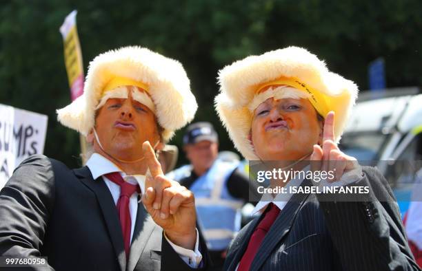 Protesters against the UK visit of US President Donald Trump demonstrate outside Chequers, the prime minister's country residence, where Trump and...