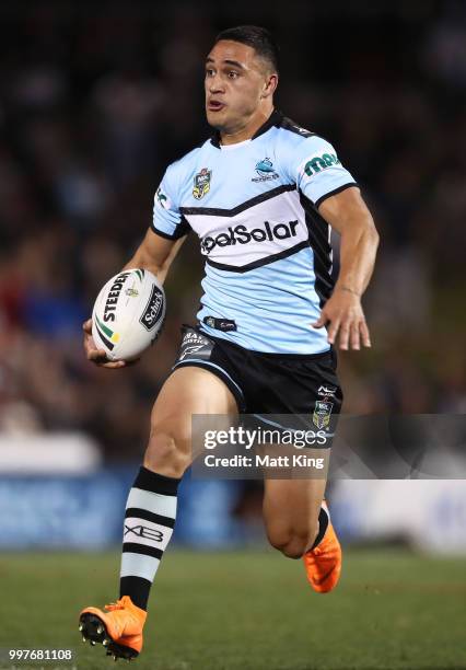 Valentine Holmes of the Sharks runs with the ball during the round 18 NRL match between the Panthers and the Sharks at Panthers Stadium on July 13,...