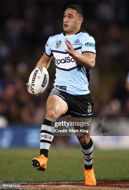 Valentine Holmes of the Sharks runs with the ball during the round 18 NRL match between the Panthers and the Sharks at Panthers Stadium on July 13,...