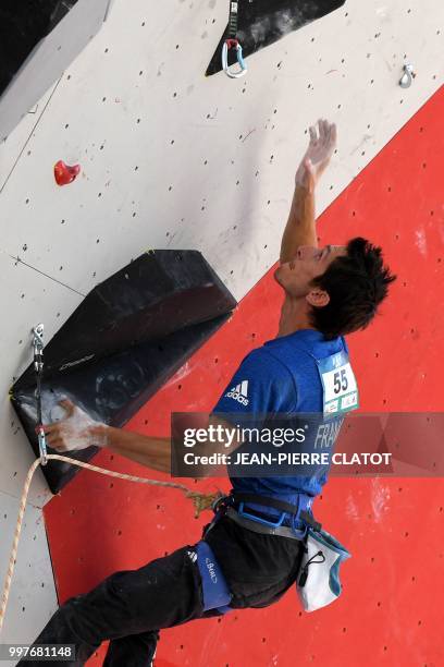 France Romain Desgranges - men's world number one - climbs during the semi-final of 2018 International Federation of Sport Climbing Climbing World...