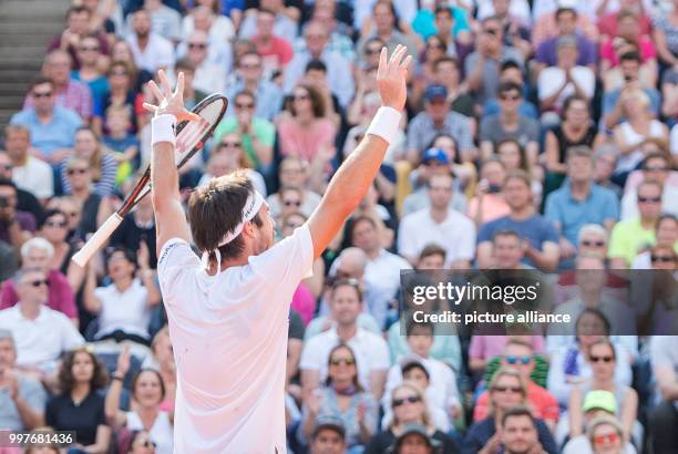 Leonardo Mayer of Argentina wins against Florian Mayer of Germany in the men's singles final of the Tennis ATP-Tour German Open in Hamburg, Germany,...