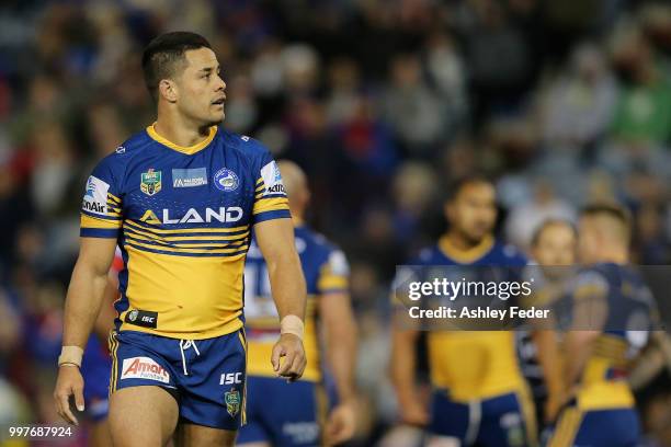 Jarryd Hayne of the Eels looks at the scoreboard during the round 18 NRL match between the Newcastle Knights and the Parramatta Eels at McDonald...