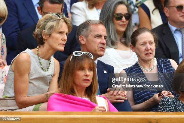 Governer of the Bank of England Mark Carney and his wife Diana Carney attend day eleven of the Wimbledon Lawn Tennis Championships at All England...