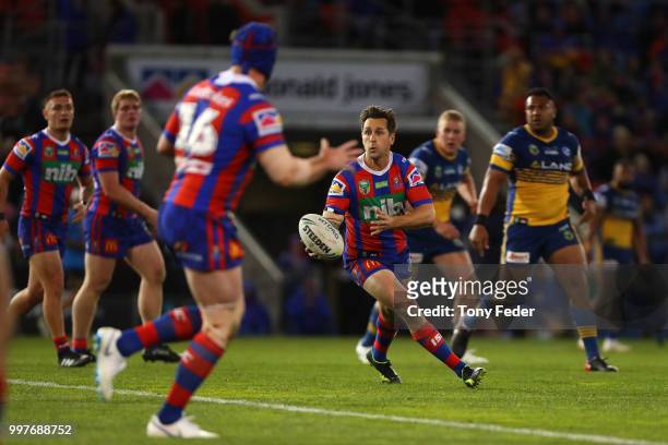 Mitchell Pearce of the Knights runs the ball during the round 18 NRL match between the Newcastle Knights and the Parramatta Eels at McDonald Jones...