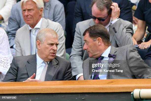 Prince Andrew, Duke of York and Wimbledon Chairman Philip Brook attend day eleven of the Wimbledon Tennis Championships at the All England Lawn...