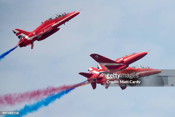 BAe Hawks from the Royal Airforce aerobatic team, the Red Arrows, perform at the Royal International Air Tattoo at RAF Fairford on July 13, 2018 in...