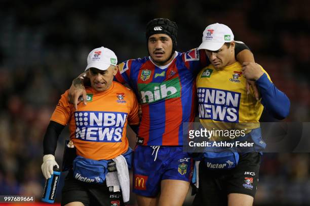 Sione Mata'Utia of the Knights is taken off for an injury yduring the round 18 NRL match between the Newcastle Knights and the Parramatta Eels at...
