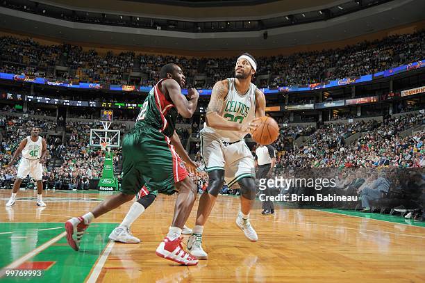 Rasheed Wallace of the Boston Celtics steps back for a shot against Luc Richard Mbha a Moute of the Milwaukee Bucks on April 14, 2010 at the TD...