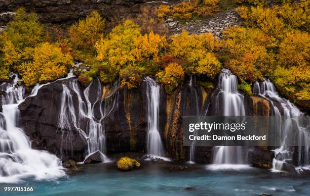 hraunfossar falls - hraunfossar stock pictures, royalty-free photos & images