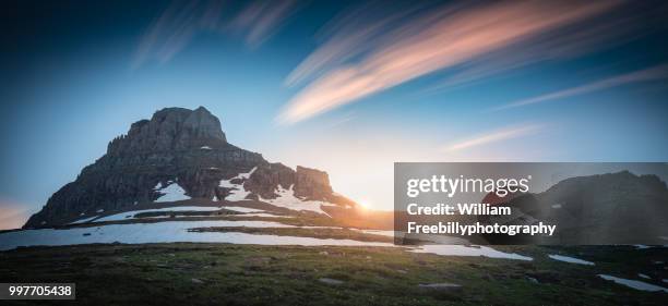 logan pass sunset with long exposure - logan pass imagens e fotografias de stock