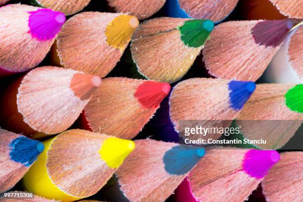 close up macro shot of colouring pencils - colouring fotografías e imágenes de stock