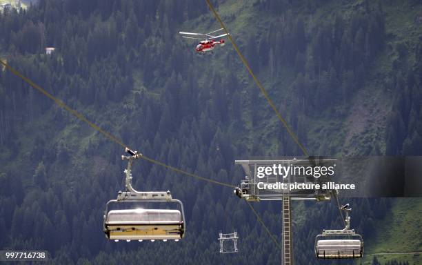 Transport helicpoter Kamov KA 32 A12 transports a part of a cable car support up the Ifen in the Kleinwalser valley near Riezlern, Austria, 31 July...