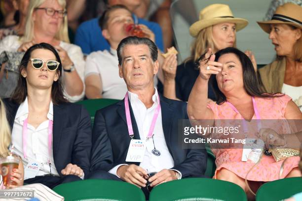 Dylan Brosnan, Pierce Brosnan and Keely Shaye Smith attend day eleven of the Wimbledon Tennis Championships at the All England Lawn Tennis and...