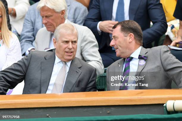 Prince Andrew, Duke of York and Wimbledon Chairman Philip Brook attend day eleven of the Wimbledon Tennis Championships at the All England Lawn...