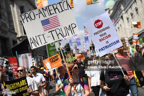 Protesters join a Women's march in central London to demonstrate against President Trump's visit to the UK, on July 13, 2018 in London, England. Tens...